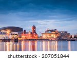 Pretty night time illuminations of the stunning Cardiff Bay, many sights visible including the Pierhead building (1897) and National Assembly for Wales.