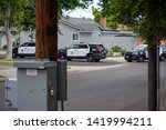 Small photo of Northridge, CA / United States - May 27, 2019: LAPD Patrol Units respond to brandishing/ADW call in suburban neighborhood with mulitple police cars. Three LAPD cars are seen here.