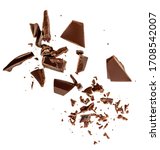 Small photo of Flying Dark chocolate pieces isolated on white background. Chocolate bar chunks, shavings and cocoa crumbs Top view. Flat lay