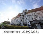 Small photo of Tokyo May 5 2023: RX-0 Unicorn Gundam statue display outside Odaiba's DiverCity Tokyo Plaza in Odaiba seaside park
