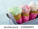 Three Ice Cream Cones In A...