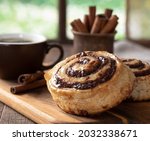 Cinnamon Roll And Hot Cup Of...