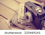 Old Retro Camera On Vintage...