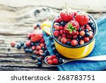 Berries on Wooden Background. Summer Organic Berry over Wood. Agriculture, Gardening, Harvest Concept