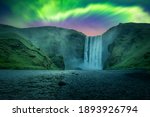 Green aurora light behind famous Skogafoss waterfall on Skoga river. Iceland, Europe. Courtesy of NASA. Photo collage