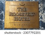 Small photo of NEW YORK - MAY 23, 2023: New York City's new migrant welcome center at the former four-star Roosevelt Hotel in Midtown Manhattan. It opened to accommodate an anticipated influx of asylum seekers