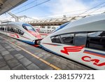 Small photo of MOSCOW, RUSSIA, on AUGUST 23, 2023. Leningrad station. The dual modern high-speed train Sapsan near a platform. Place of a hitch of trains