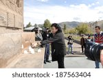 Small photo of SPITAK, ARMENIA - OCTOBER 1: Tony Iommi of Black Sabbath lays flowers at the Memorial to the Spitak earthquake victims on October 1, 2009 in Spitak. He is one of participants of “Rock Aid Armenia”.