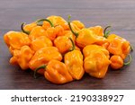 Bunch of Yellow Habaneros or Scotch Bonnet Peppers Closeup