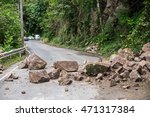 Rock sliding blocks the road 