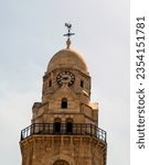 Small photo of Clock tower with a weathercock in Jerusalem, Israel