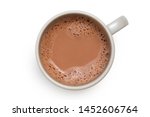 Hot chocolate in a grey ceramic mug isolated on white from above.