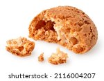 Broken amaretti biscuit isolated on white.