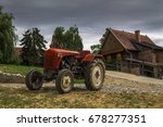 Rustic Tractor And House On A...
