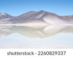 Small photo of Deserto de Atacama lakes, salar. Landscape with view on a lake in the Desert of Atacama in Chile, near San Pedro de Atacama. Desolate barren unreal background.