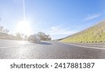 Small photo of Los Angeles, California, USA-December 4, 2022-POV-During the day, driving on HWY 101 near Arroyo Quemada Beach, California, offers scenic views of the surrounding coastal landscape.