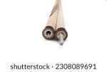 Small photo of Billiard cues on a white background. Parts of a billiard cue close-up. Live photos of a billiard cue.