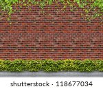 Tree in pot with brick wall background