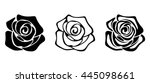 Set of three vector black silhouettes of rose flowers isolated on a white background.