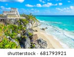Mayan ruins of Tulum at tropical coast. El Castillo Temple at paradise beach. Mayan ruins of Tulum, Quintana Roo, Mexico.