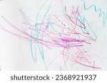 Small photo of A pastel-colored masterpiece of doodles and scribbles on the wall, the creative work of a child