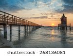 wooden pier and lighthouse in... | Shutterstock . vector #268136081