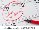 Save the Date written on a calendar - November 11
