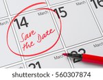 Save the Date written on a calendar - March 14
