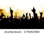 silhouettes of concert crowd in ... | Shutterstock . vector #174042584