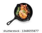Fried pork steak in frying pan  isolated on white background. 