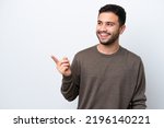 Small photo of Young Brazilian man isolated on white background intending to realizes the solution while lifting a finger up
