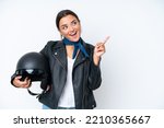 Small photo of Young caucasian woman with a motorcycle helmet isolated on blue background intending to realizes the solution while lifting a finger up