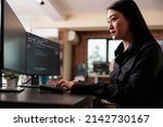 Cyber security company employee developing blockchain based database processing system. Cybernetic officer coding a machine learning software to protect mainframe encrypted files.