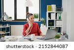 Small photo of Female secretary using landline phone at company job, answering call from manager to plan financial strategy. Business employee working on research with office telephone conversation.