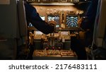 Small photo of Airplane captain throttling engine to takeoff and fly plane, using power handle and control panel command. Pushing lever to travel and use aerial navigation, flying aircraft. Close up.