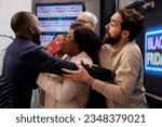 Small photo of Angry mad shoppers fight over bargains, crowd of crazy frenzy diverse people pushing security guard and shoving through during Black Friday sales, trying to be first in store and get best deals
