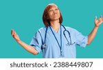 Small photo of Close up shot of conflicted BIPOC nurse doing perplexed gesturing while at work. Baffled perplexed healthcare specialist taken aback by what she hears, isolated over studio background