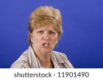 Small photo of Woman expletive deleted on a blue back ground