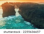 Arch in the rock. Seascape in the morning. Rocky sea coast at sunrise. Beach Playa de Las Catedrales in Ribadeo. Galicia Spain Europe