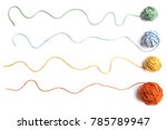 Colorful cotton thread balls isolated on white background. Set of four color (orange, yellow, green, blue) thread balls.