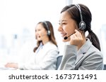 smiling telemarketing asian... | Shutterstock . vector #1673711491