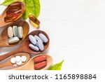 Variety Of Vitamin Pills In...