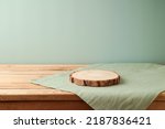 Empty wooden log on table with modern tablecloth. Kitchen mock up for design and product display