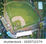 Small photo of Green grass on baseball field aerial drone view