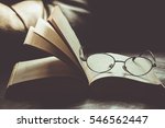 Open Book With Reading Glasses...