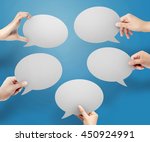 Hands hold white bubble quote chat on blue background., Notification speech bubble concept, chat concept