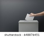 Woman person vote with ballot box on blank voting concept.