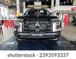 Small photo of Sukhothai, Thailand. 5th August 2023: The All New Mitsubishi Triton displayed at the Sukhothai Mitsubishi Motor Show in Sukhothai, Thailand