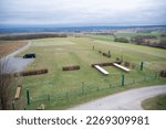 Small photo of Model airfield in Schaafheim during cloudy stormy day, strong crosswind, countryside, Germany