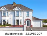White traditional semi detached house view